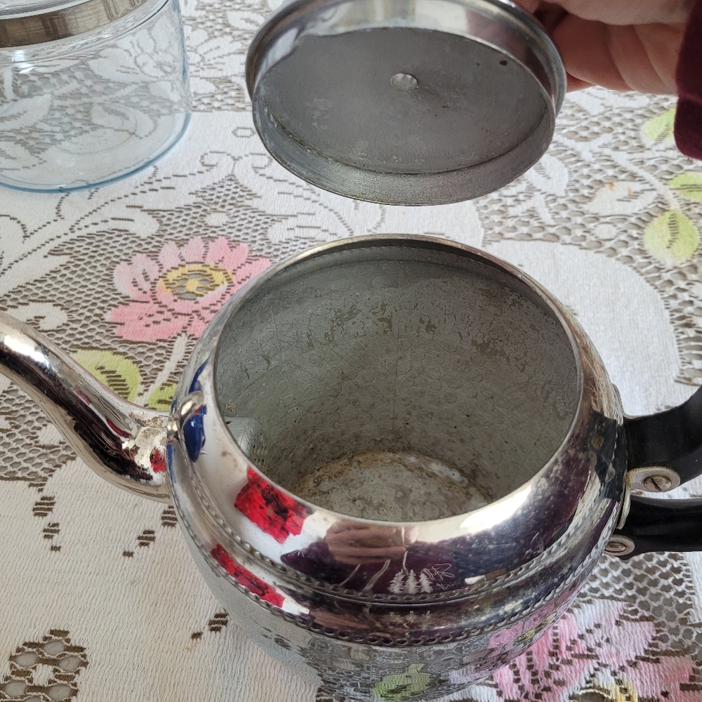 Elegant Silver Teapot with Black Handle - Picture 6 of 9